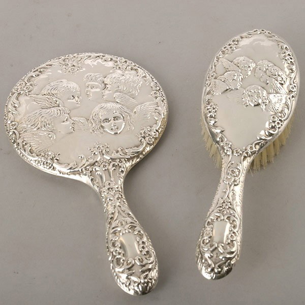 Two Piece English Sterling Mounted Dresser Set: Two Piece English Sterling Mounted Dresser Set, "B & Co.": brush and mirror {Height of mirror 9 1/4 inches}