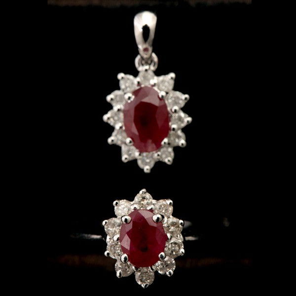 RUBY, DIAMOND, 18K WHITE GOLD JEWELRY.: COLLECTION OF RUBY, DIAMOND, 18K WHITE GOLD JEWELRY. Including a ring centering one oval ruby weighing approximately 0.45 ct., accented by ten full-cut diamonds weighing a total of approximately 0.20