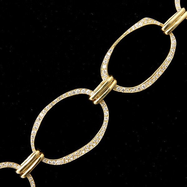 IPPOLITA DIAMOND, 18K YELLOW GOLD BRACELET.: IPPOLITA DIAMOND, 18K YELLOW GOLD BRACELET. The "Anniversary" bracelet features approximately three hundred and forty full-cut diamonds weighing a total of approximately 3.00 cts., bead set in 18k yel