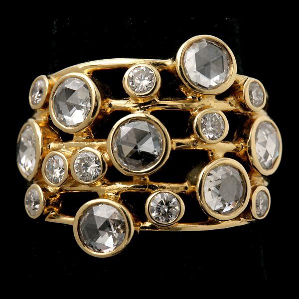 IPPOLITA DIAMOND, 18K YELLOW GOLD RING.: IPPOLITA DIAMOND, 18K YELLOW GOLD RING. The "Constellation" ring features nine full-cut and seven rose-cut diamonds weighing a total of approximately 1.00 ct., bezel set in 18k yellow gold. Signed Ipp