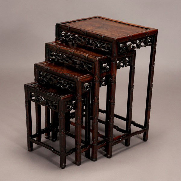 A Set of Four Rosewood Nesting Tables: A Set of Four Rosewood Nesting Tables {Largest: 27 1/2 x 19 1/4 x 13 1/2 inches (70 x 48.9 x 34.3 cm)}