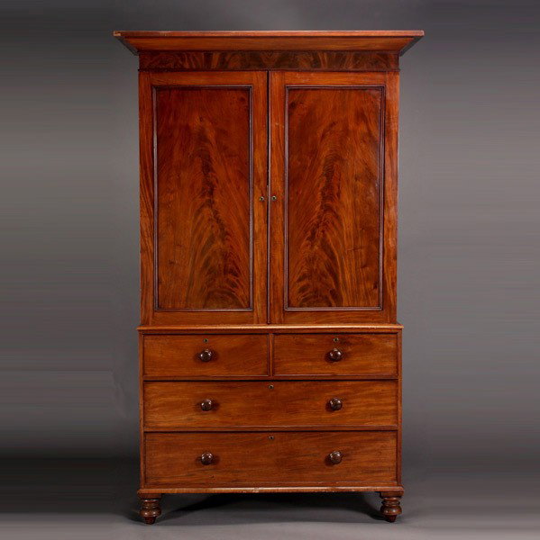 George III Mahogany Linen Press: George III Mahogany Linen Press, Early 19th Century, The upper case with outswept cornice over a pair of panel molded doors inset with recessed burl veneer, the lower case fitted with two short and tw