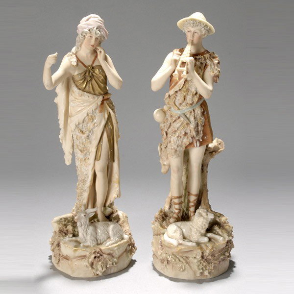 Pr Royal Dux Shepherd and Shepherdess: Pair of Royal Dux Bohemia Figures of Shepherd and Shepherdess {Height of taller 12 inches} [Several very tiny chips to both figures; horn tip chipped on ram, possible loss of element in female's right