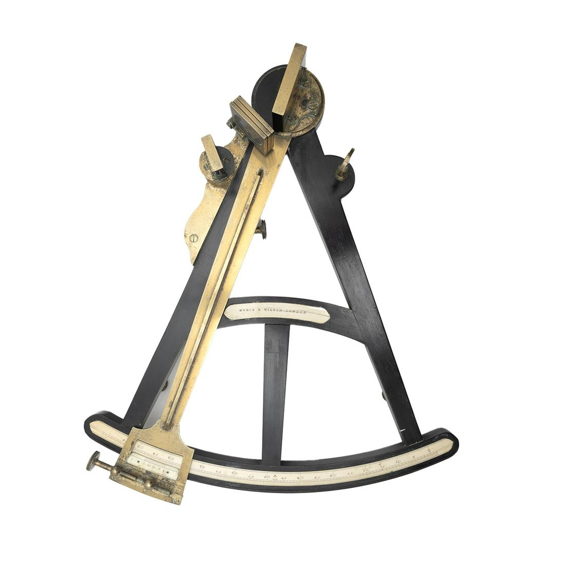 19th Century Norie & Wilson English Octant in Case: 19th Century Norie & Wilson English Octant in Case. Ebonized wood body with tooled bronze and bone inlay; all glass is present; original case included. Central bone inlaid plaque inscribed with 'NORIE