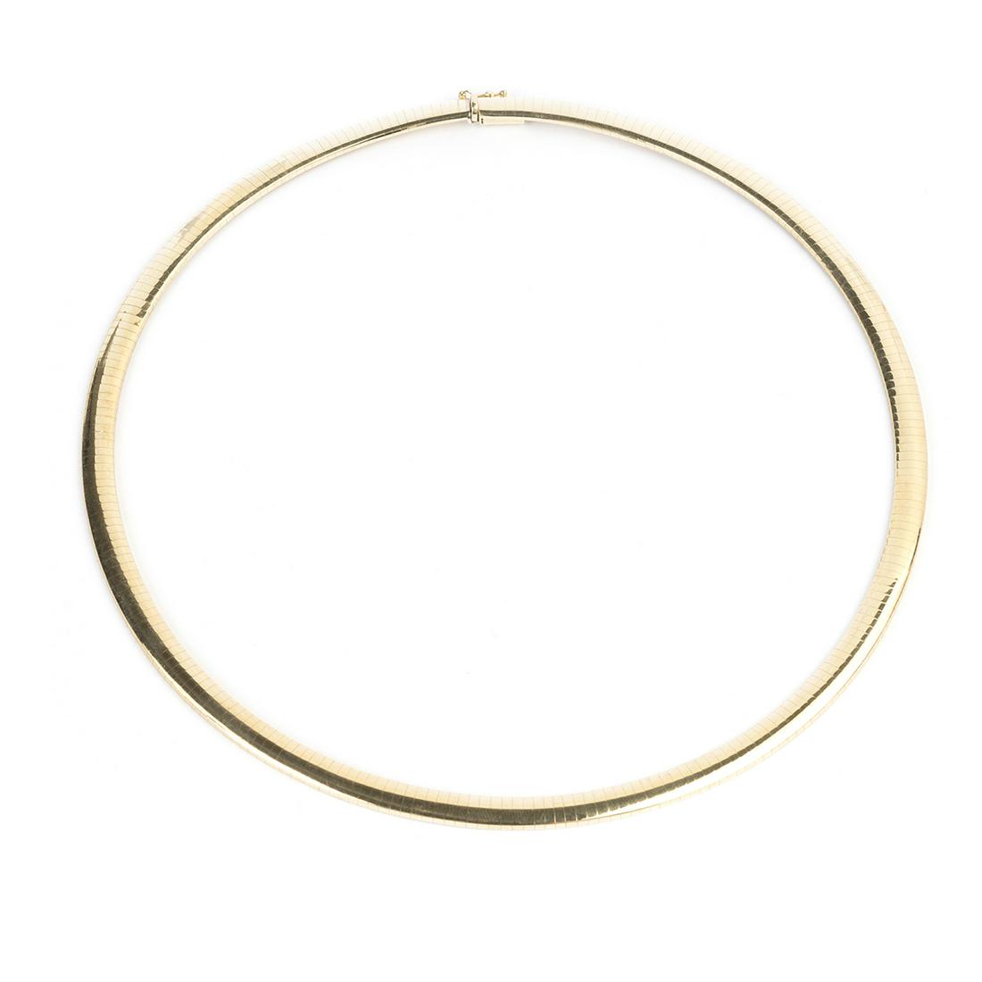 14k Yellow Gold Necklace.: 14k Yellow Gold Necklace. The 14k yellow gold omega link measuring approximately 6 mm in width, completed by a tongue and groove clasp with figure eight safety, forming an 18k inch necklace. {Gross We