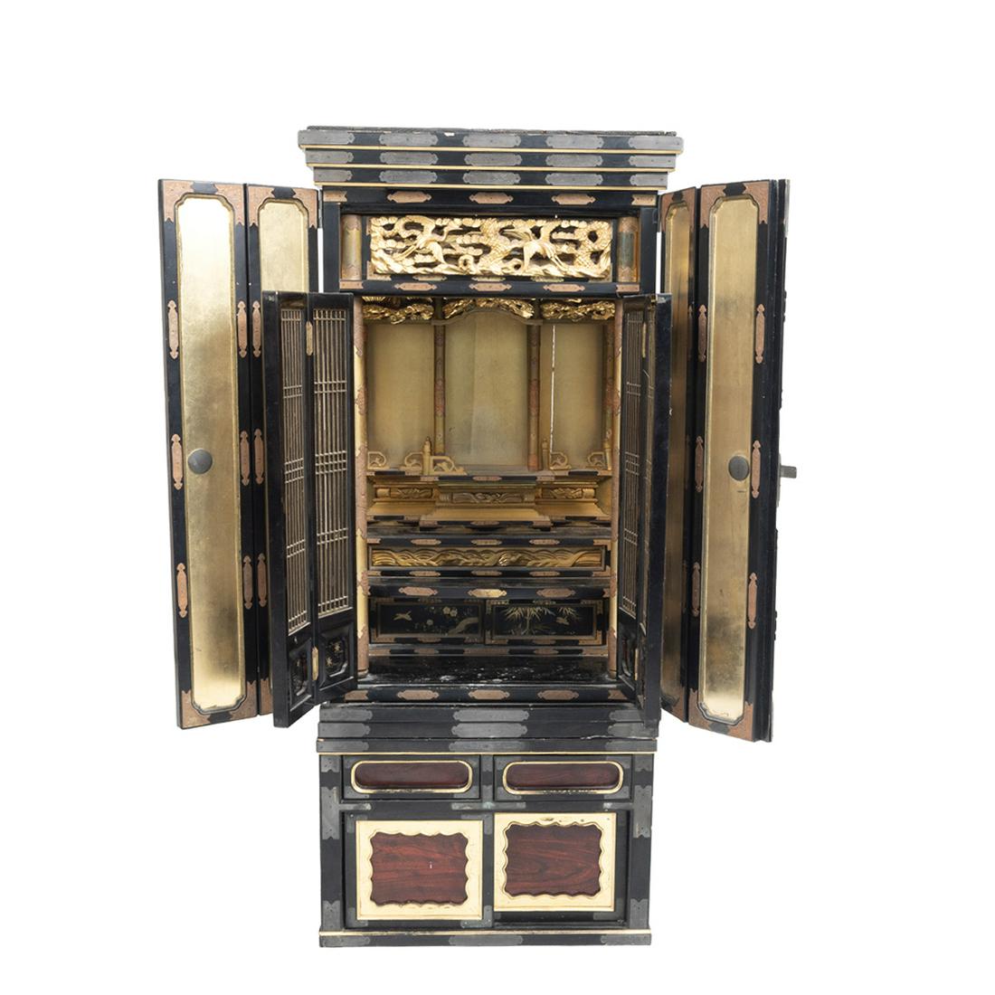 Japanese Two-Section Buddhist Shrine: Japanese Two-Section Buddhist Shrine. Of rectangular form with double-hinged doors and an interior set of louvre doors, the shrine constructed of black lacquer and gilt wood finished, the doors openin