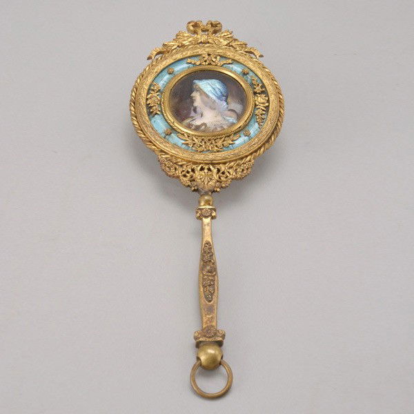 Third Republic Gilt Bronze Limoges Hand Mirror: Third Republic Gilt Bronze Limoges Enamel Hand Mirror, Circa 1900, featuring a profile portrait medallion of a raven haired beauty in Renaissance style costume {Height 11 inches}
