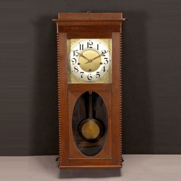 German Carl Korner Wall Clock with Brass Face: German Carl Korner Wall Clock with Brass Face {Dimensions 28 1/4 x 13 3/4 x 7 inches} Pendulum