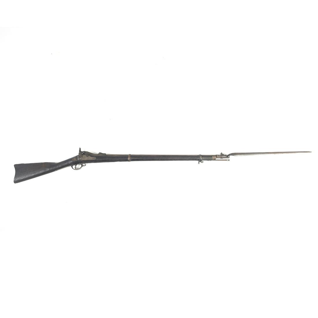 Springfield Trapdoor Rifle with Bayonet: Springfield Trapdoor Rifle with Bayonet. Ebonized wood body, socket bayonet. With serial number '567365', 'US SPRINGFIELD' to the trigger guard, the barrel with 'VPP'. Circa 1875. {Approximate dimensi