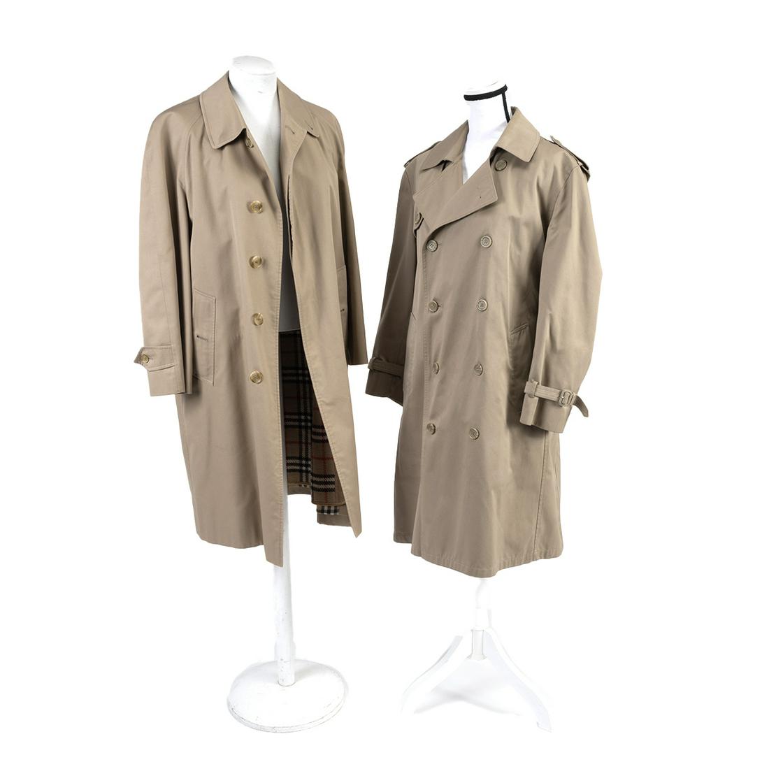 Two Burberry, Cassini Coats: Two Burberry, Cassini Coats. Burberry classic trench complete with original large plaid lining;Cassini trench with gabardine lining. Circa Late 1970s - Early 1980s. {Approximate dimensions: 44" Undera
