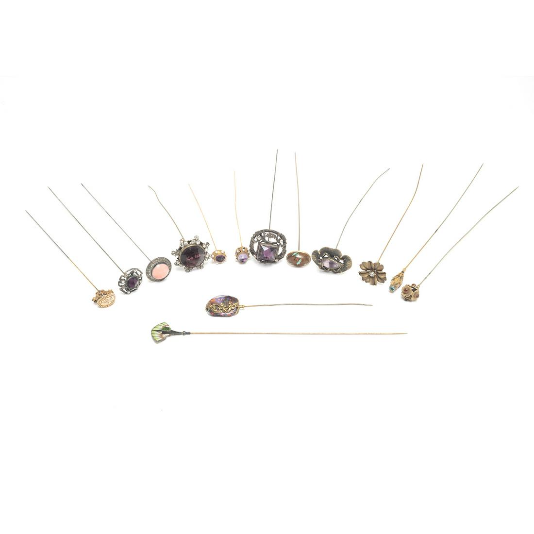 Collection of Hat Pins: Collection of Hat Pins Including Two Gold, Amethyst, Seed Pearls. One, plique a jour; one with a glass and quartz stone enclosed with a band of gilt metal flowers. Several, with gilt metal and glass "