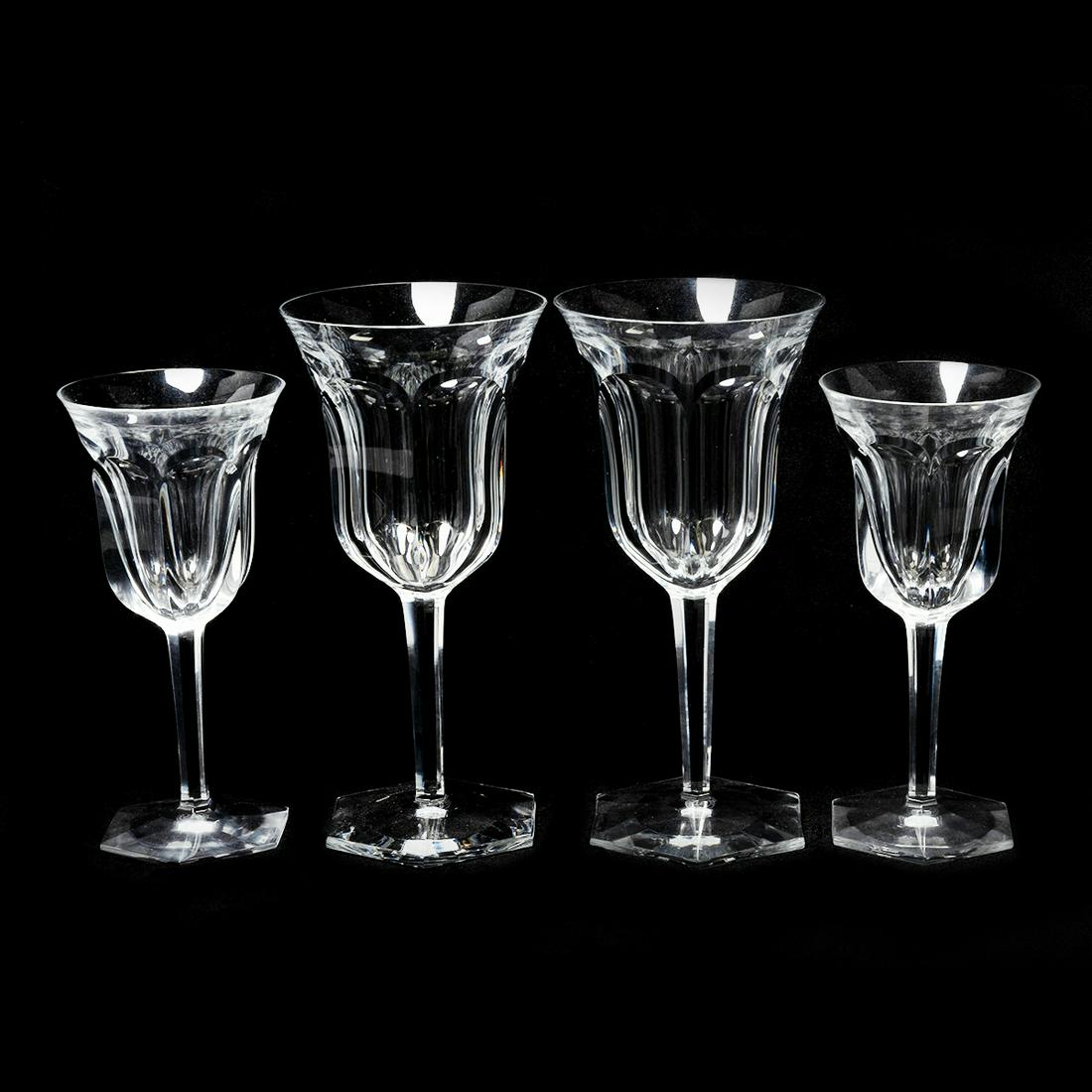 Baccarat Crystal Malmaison Pattern Stemware: Baccarat Crystal Malmaison Pattern Stemware. Comprising 12 tall water goblets, 14 claret wine glasses. Engraved mark to underside of each. France. Late 20th / early 21st Century. {Approximate dimensio