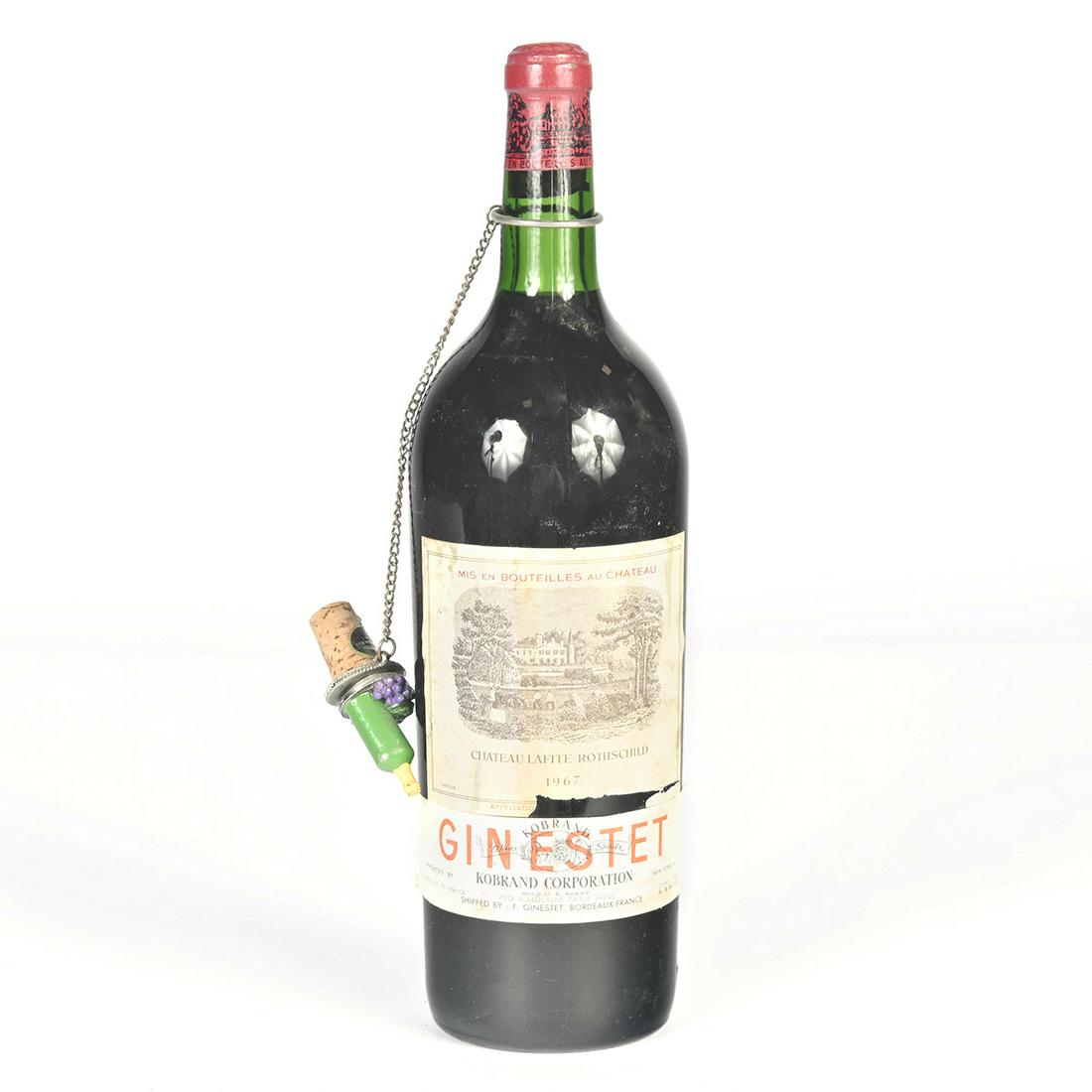 One Magnum Bottle, 1967 Chateau Lafite Rothschild Wine: One Magnum Bottle, 1967 Chateau Lafite Rothschild Wine. Chateau Lafitte Rothschild, 1967. With additional painted metal decorative stopper of wine bottle on tray with grapes, attached to neck by chain