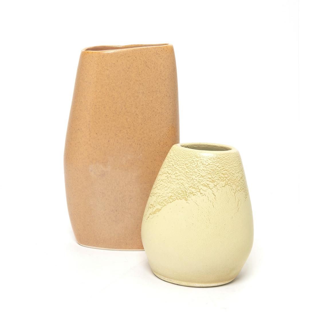 Two Russell Wright for Bauer Pottery Vases: Two Russell Wright for Bauer Pottery Vases. Comprising asymetrical vase with mottled orange glaze, and small asymetrical matte yellow glazed vase. Both with 'Russel Wright / Bauer' to the undersides.