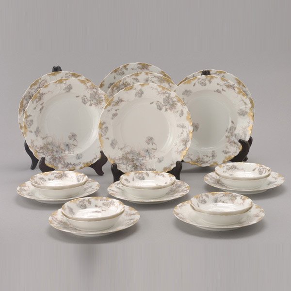 22 pieces of Haviland Limoges Porcelain Dinnerwar: 22 Pieces of Haviland Limoges Porcelain Dinnerware, With shaped rims and floral decorations. Group includes 7 soup plates, 5 salad plates and 10 finger bowls, retailed by Gumps