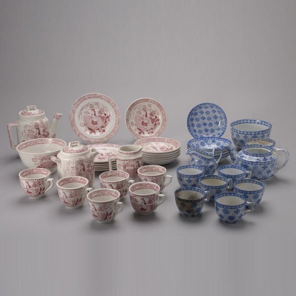 Two Child's Partial Transferware Tea Sets: Two Child's Partial Transferware Tea Sets, One blue and white Floral and the other red and white with figure of a girl, 38 pieces.
