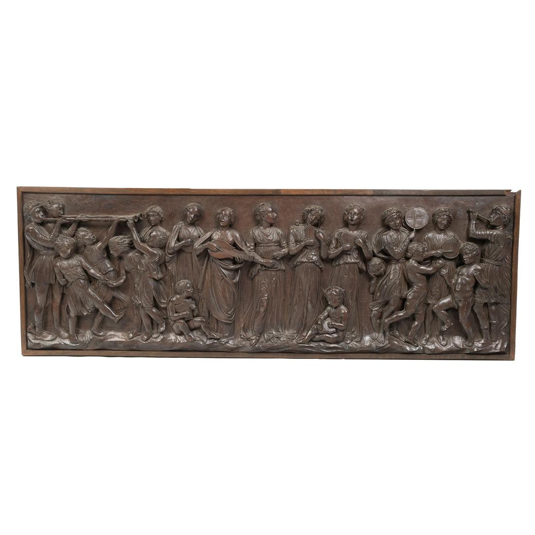 Beaux Arts Carved Walnut Frieze in Mahogany Frame.: Beaux Arts Carved Walnut Frieze in Mahogany Frame. In the manner of German Renaissance friezes, with children playing musical instruments, most standing, and two seated to front, all clothed in the ma