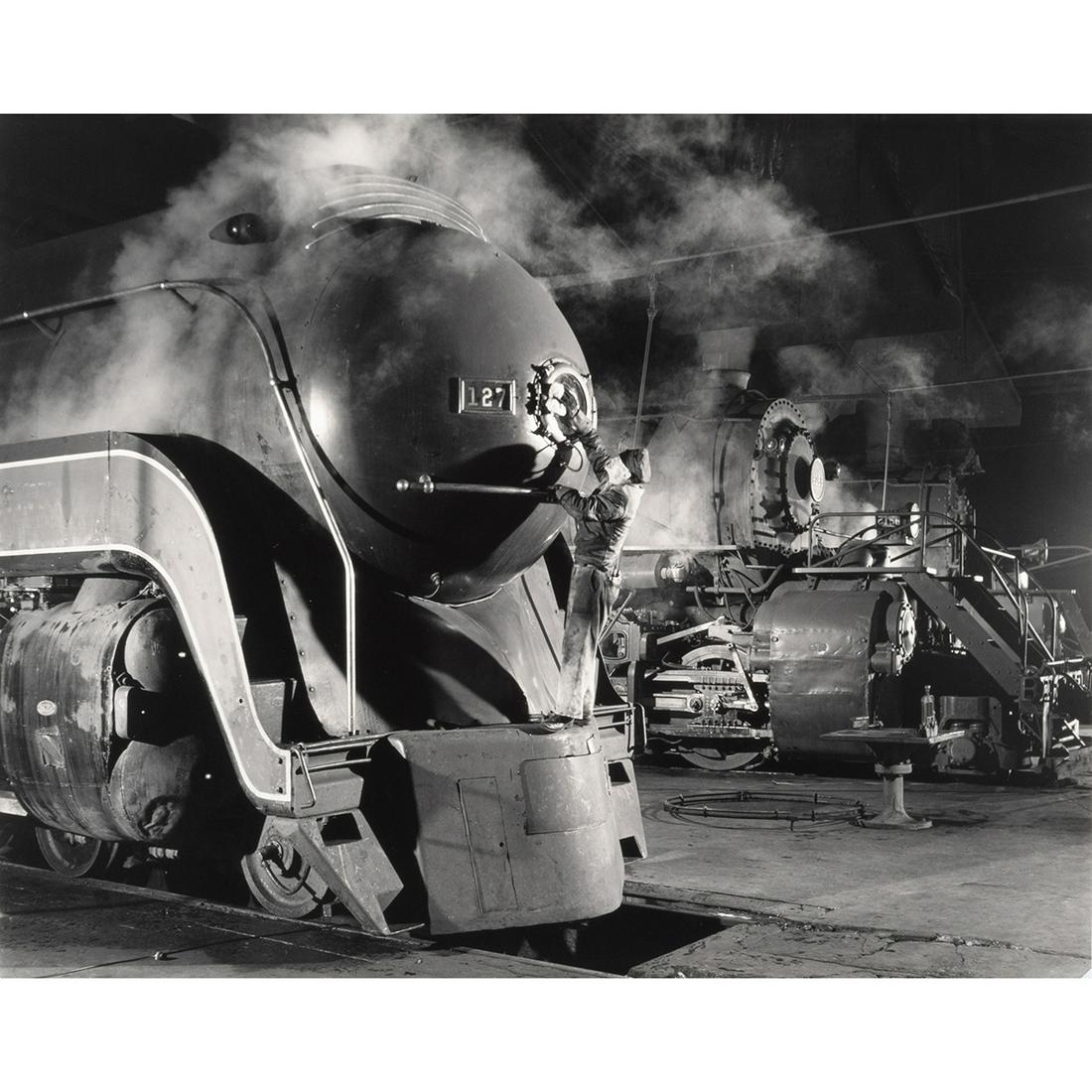 O. Winston Link, Dalhouse Cleans Headlight, photo: O. WINSTON LINK (American, 1914-2001), Dalhouse Cleans Headlight Shaffers Crossing, Roanoke, Virginia, gelatin silver print, (approximate dimensions - image: 15 1/2 x 19 3/8 inches, sheet: 16 x 19 7/8