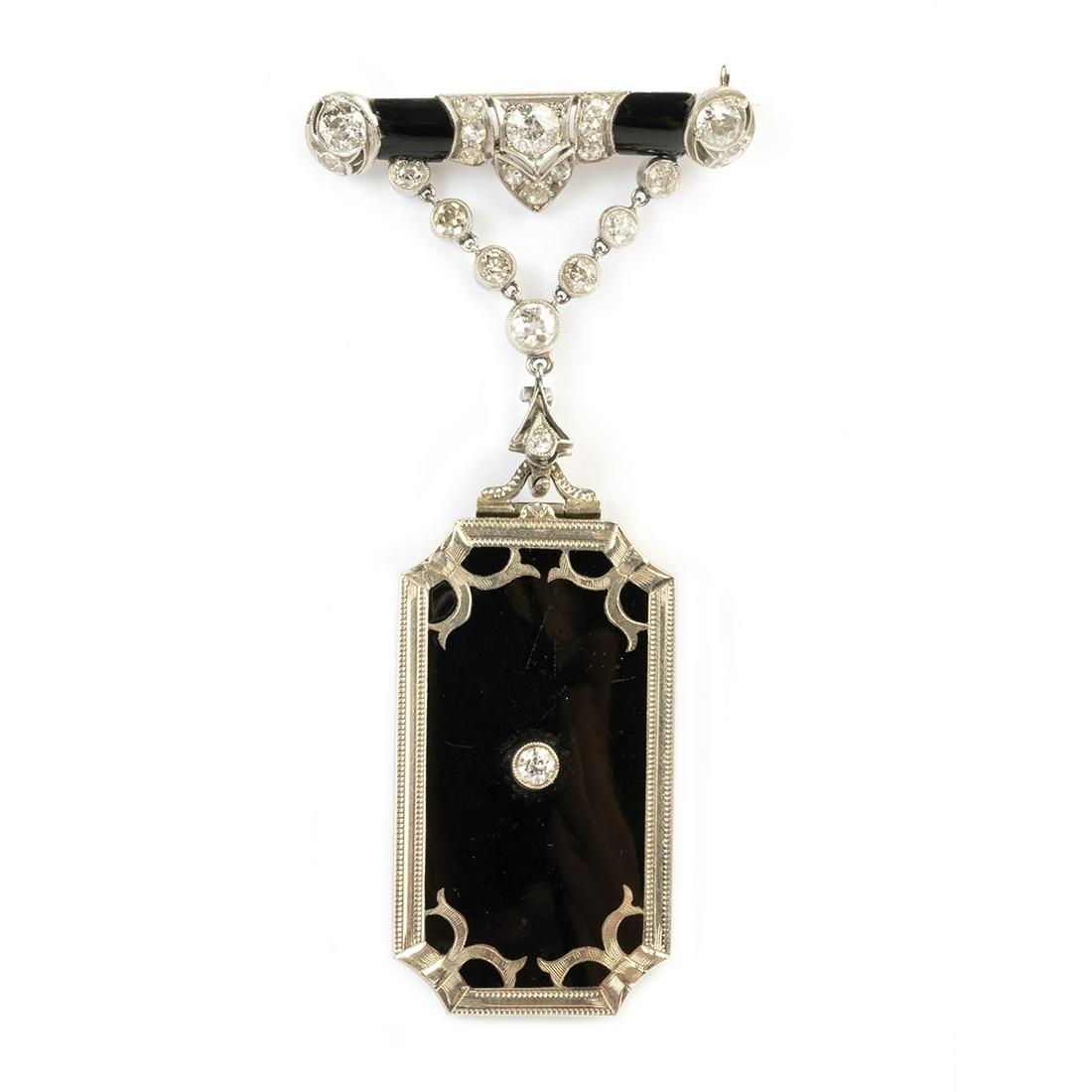 Art Deco Diamond, Gold, Platinum Locket Brooch.: Art Deco Diamond, Enamel, Black Onyx, 18k White Gold, Platinum Locket Brooch. Featuring one full-cut diamond weighing approximately 0.10 ct., accented by black enamel, set in an 18k white gold locket 