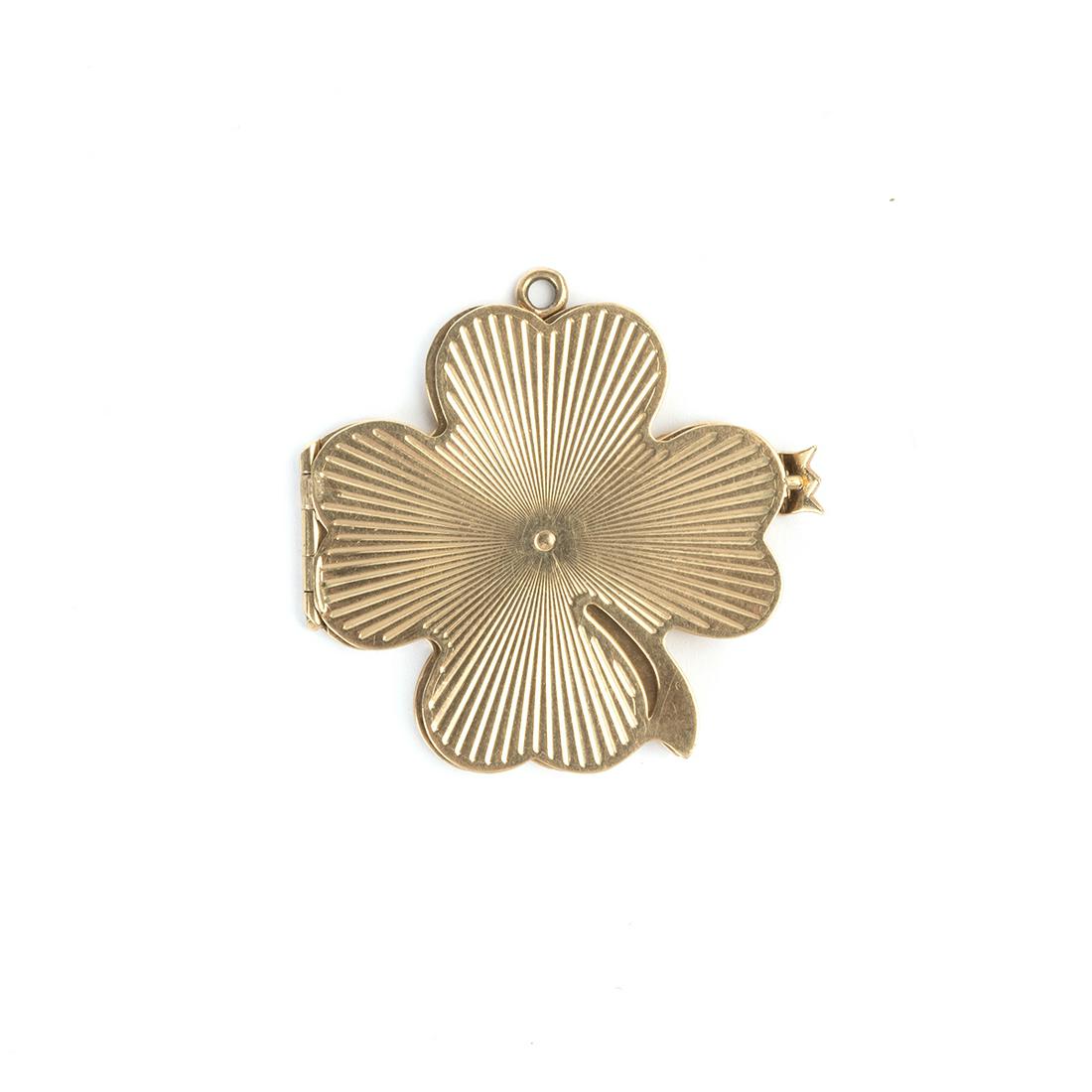 14k Yellow Gold Four Leaf Clover Locket.: 14k Yellow Gold Four Leaf Clover Locket. The 14k yellow gold four leaf clover locket measuring approximately 37 x 35 mm, opening to reveal four areas for pictures. {Gross Weight: 11.1 dwts}