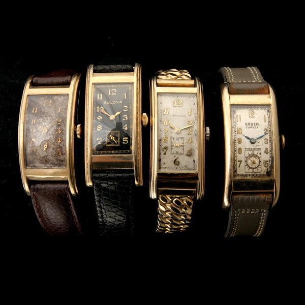 4 MECHANICAL GOLD-FILLED CURVEX WRISTWATCHES.: COLLECTION OF FOUR MECHANICAL GOLD-FILLED CURVEX WRISTWATCHES. Including one Longines gold-filled, metal wristwatch measuring approximately 36 x 20 mm; two Gruen gold-filled, leather wristwatches each