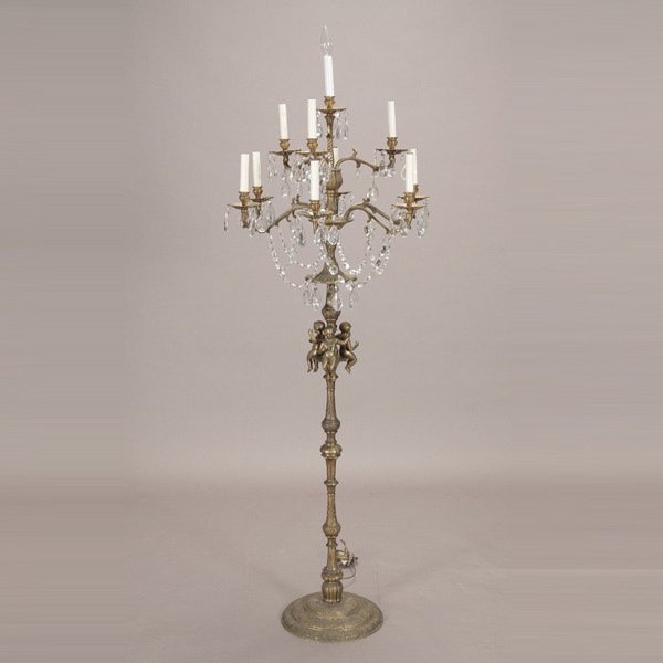 Renaissance Style 10 Light Chandelier Floor Lamp: Renaissance Style Ten Light Chandelier Form Floor Lamp with three figures of applied cherubs and hung with lustres {Height 66 inches}
