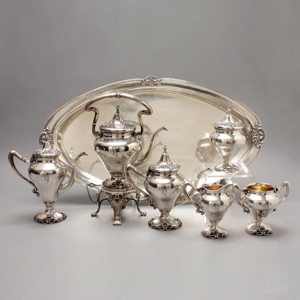 Art Nouveau Shreve 6pc Tea Service & Tray: Art Nouveau Sterling Six Piece Tea Service with Sterling Tray. Comprising: a hot water kettle on stand with key locks, a coffee pot, a teapot, a creamer, a covered sugar, an open sugar; and a tray; ea