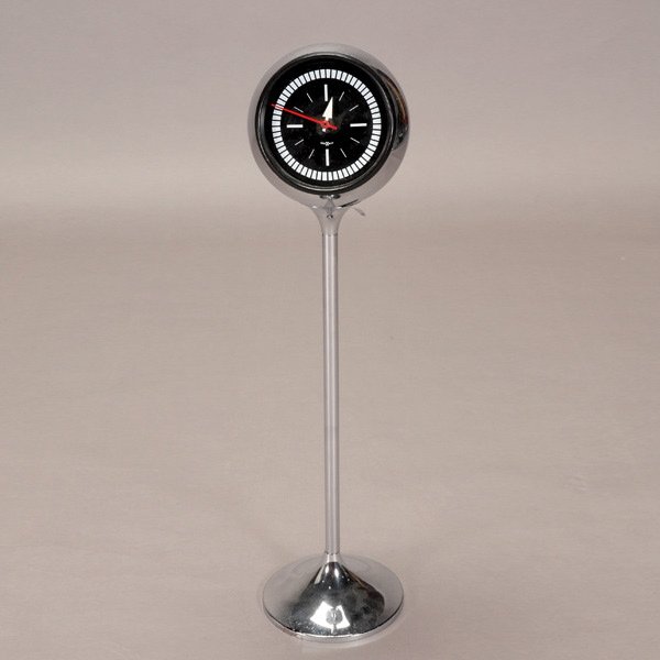 Chrome Howard Miller Floor Clock: George Nelson and Associates Chrome Floor Clock. Howard Mill Clock Company. {Height 31 inches; diameter 7 1/2 inches}