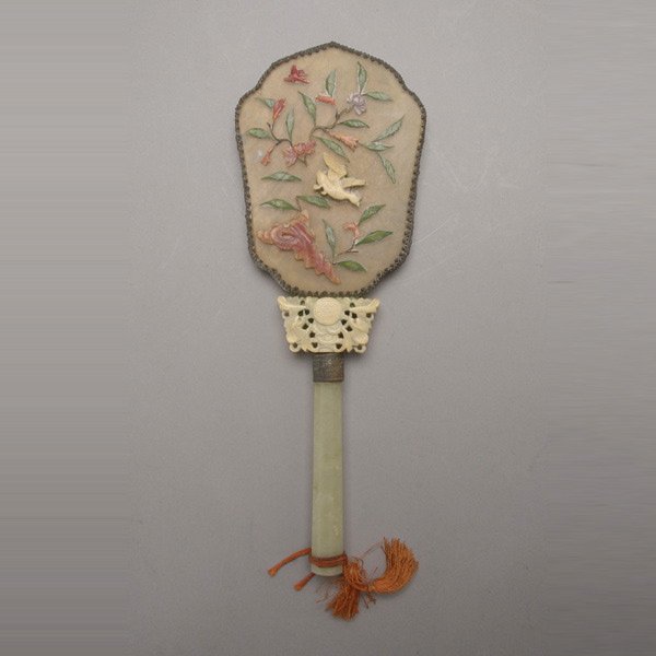 A Hardstone-Inlaid Hand Mirror: A Hardstone-Inlaid Hand Mirror, decorated with birds and flowers {Length: 11 inches (27.9 cm)} [Small losses]