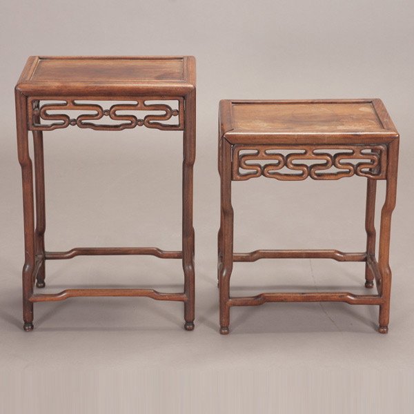 A Pair of Small Rectangular Hardwood Display Stand: A Pair of Small Rectangular Hardwood Display Stands, with openwork aprons of stylized meanders, stepped legs separated by matching stepped stretchers {Taller: 21 1/2 x 14 x 9 inches (54.5 x 35.5 x 23 