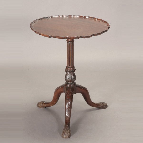 Victorian Tripod Tea Table with Pie Crust Rim: Victorian Mahogany Tripod Tea Table, 19th Century, with a pie crust rim, raised on leafy paw feet {Height 28 inches; diameter 22 inches}