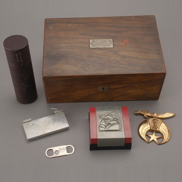 English Walnut Humidor;: English Walnut Humidor; together with a Shriner's ornament; a cigar cutter; a cased flashlight; and a Hickok box with copper tray (6) {Dimensions of humidor 4 1/2 x 11 1/4 x 7 1/2 inches}
