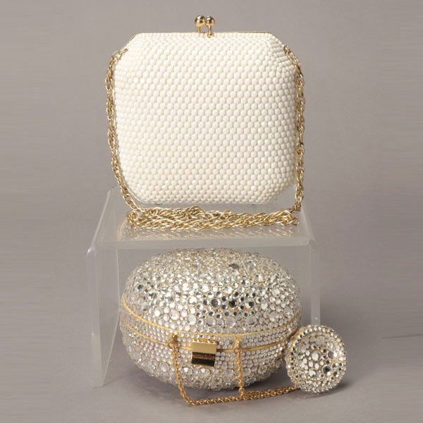 2 VINATGE EVENING BAGS WITH OPERA GLASSES.: COLLECTION OF TWO VINATGE EVENING BAGS WITH OPERA GLASSES. The dome form purse is encrusted in varying sized faux white crystals. The gold tone chain link strap is adorned with a faux crystal disc sha