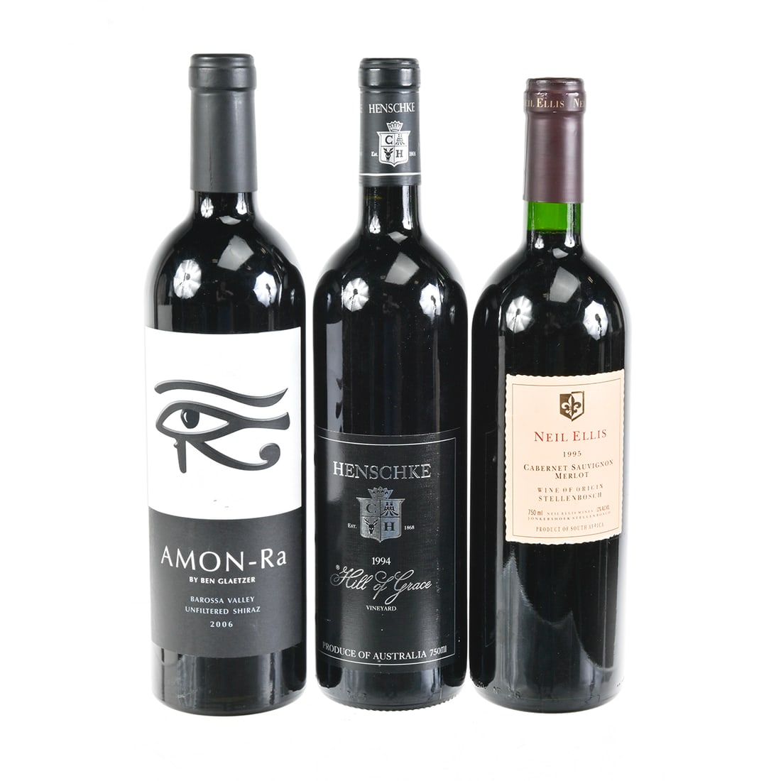 Three Botlles Henschke, Amon-Ra and Neil Ellis Wines: Three Botlles Henschke, Amon-Ra and Neil Ellis Wines. One bottle each of 1994 Henschke Hill of Grace, 1995 Neil Ellis Cabernet Sauvignon Merlot; 2006 Ben Glaetzer Amon-Ra Barossa Valley unfiltered Shi