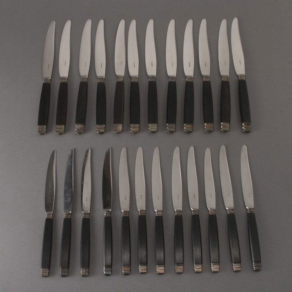 Set of Twenty-four French Ebony Handled Knives: Set of Twenty-four French Ebony Handled Knives: twelve dinner (length 9 1/2 inches); and twelve fruit (length 8 inches)
