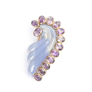 Attributed to Suzanne Belperron Multi-Stone Brooch.: Attributed to Suzanne Belperron French Chalcedony, Amethyst, 18k Yellow Gold Brooch. Featuring one carved chalcedony in a swirl motif measuring approximately 57.2 x 33.1 mm, accented by thirteen oval-