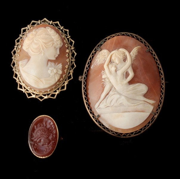 COLLECTION OF CAMEO, 14K, METAL ITEMS.: COLLECTION OF CAMEO, 14K, METAL ITEMS. Including one shell cameo, metal brooch; one shell cameo, 14k yellow gold pendant-brooch together with on sardonyx cameo, 14k yellow gold ring size 5 1/2. Shell 