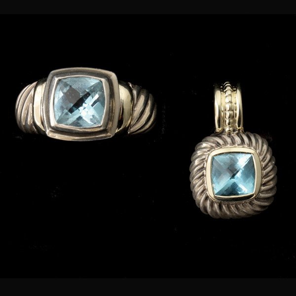 2 BLUE TOPAZ, STERLING SILVER, 14K JEWELRY ITEMS.: COLLECTION OF TWO DAVID YURMAN, BLUE TOPAZ, STERLING SILVER, 14K JEWELRY ITEMS. Including one blue topaz, sterling silver ring accented by 14k yellow gold bands on either side of the stone, ring size 