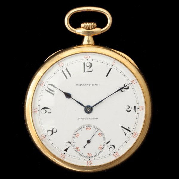 TIFFANY & PATEK PHILIPPE GOLD POCKET WATCH.: TIFFANY & CO., PATEK PHILIPPE & CO. 18K YELLOW GOLD OPEN FACE POCKET WATCH. DIAL: Round, white, black Arabic numeral hour markers, outer black minutes track, red Arabic numeral seconds, sunken subsidi