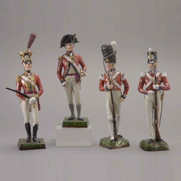 Group of Four German Porcelain Soldiers: Group of Four German Porcelain Soldiers {Height of tallest 12 1/2 inches} [Losses to weapons and other small parts]