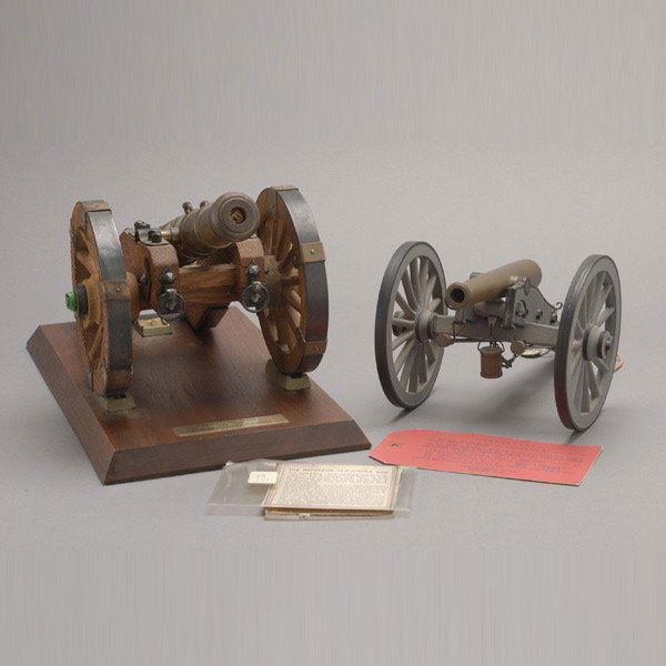 Two Scale Cannon Models: Two Scale Cannon Models: a Centennial Guns 12 Pound Napoleon Gun-Howitzer 1 inch scale model; and a Civil War era model {Length of longer 14 inches}