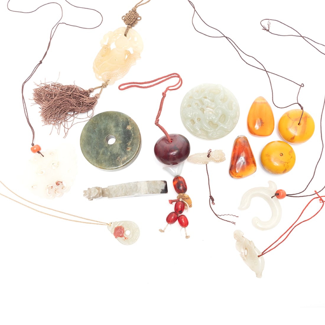 Group of Chinese Jade and Amber Pendants (1 of 3)