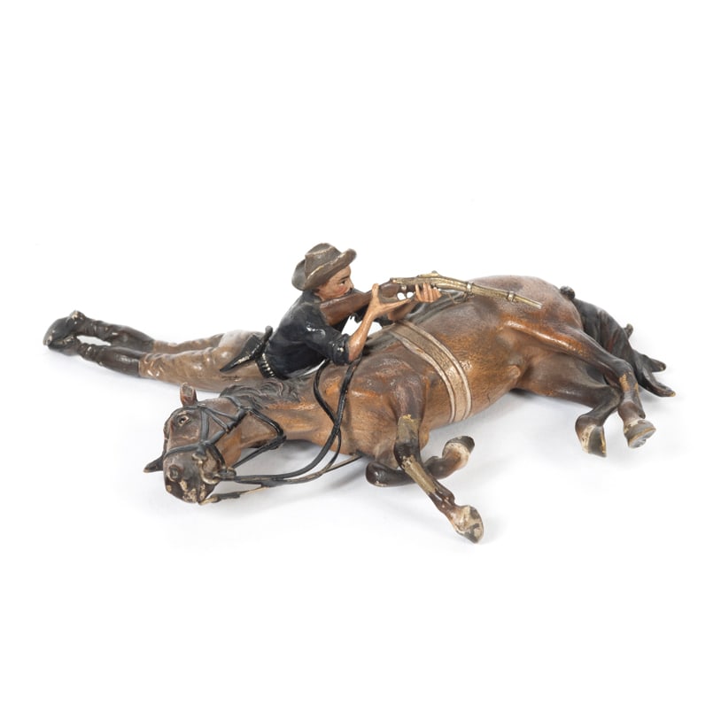 Bergmann Cold Painted Bronze Downed Horse with Rider: Bergmann Cold Painted Bronze Downed Horse with Rider. Western man with rifle propped up on his downed horse. Markings to horse and rider read 'B Amphora mark, GESCHUTZT 4866'. {Approximate dimensions: