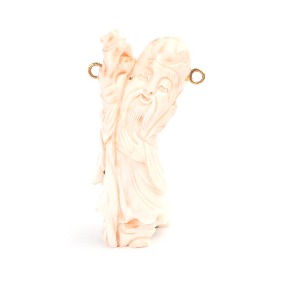 *Coral, 14k Yellow Gold Pendant.: *Coral, 14k Yellow Gold Pendant. Depicting Shoulao, the carved coral pendant measuring approximately 70 x 31 mm, completed by two 14k yellow gold bails. {Gross Weight: 43.5 dwts}