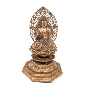 A Chinese Carved and Gilt Seated Buddha