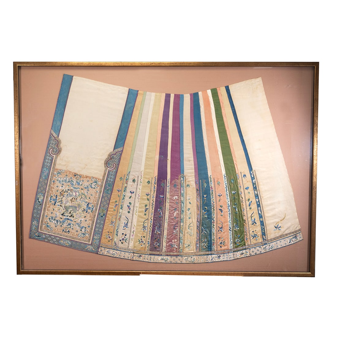 Framed Chinese Embroidered Skirt: Framed Chinese Embroidered Skirt. Embroidered on various colored silk, framed and glazed. {Frame size: 38 3/4 x 54 1/4 inches (98.4 x 137.7 cm)}.