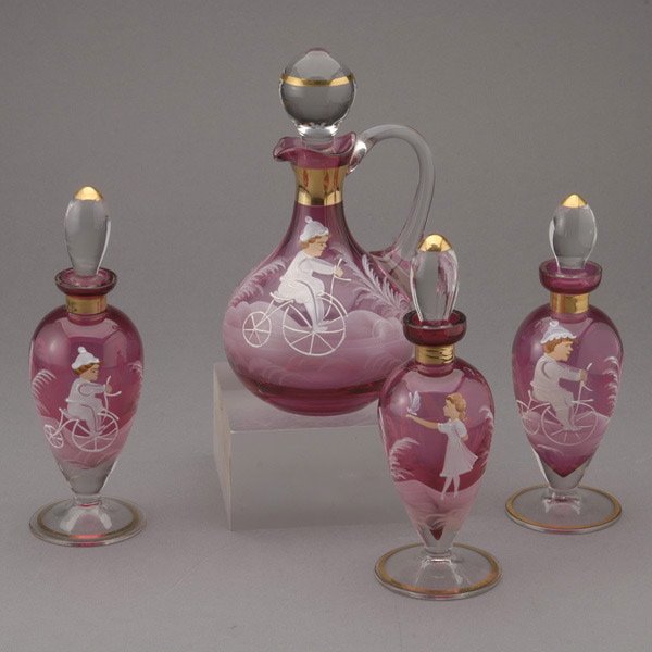 Group of Four Mary Gregory Bottles: Group of Three Mary Gregory Perfume Bottles and a Cruet (4) {Height of tallest 6 3/4 inches}