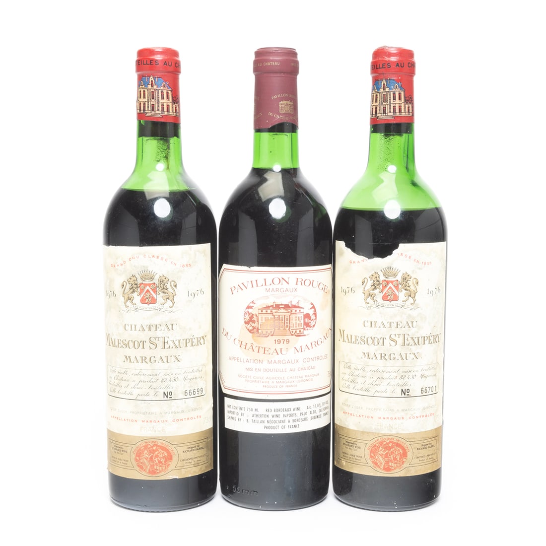 Three Bottles, 1970s Margaux Wines: Three Bottles, 1970s Margaux Wines. Two Bottles 1976 Chateau Malescot St. Exupery Margaux, bottle numbers 66699, and 66701, and one bottle 1979 Pavillon Rouge du Chateau Margaux wine. Condition: Label
