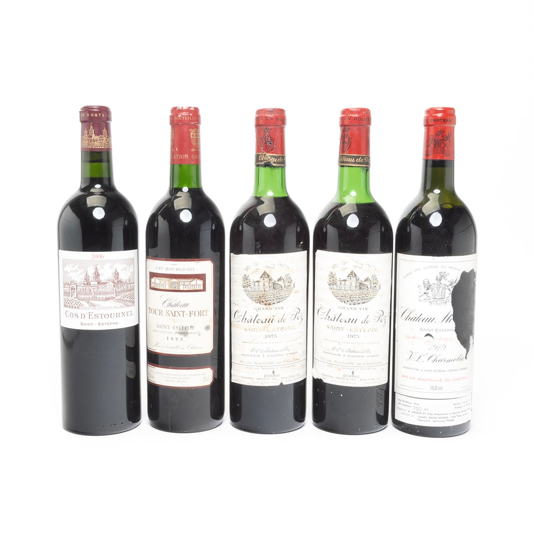 Five Bottles, 70s and 90s Saint-Estephe Wine: Five Bottles, 70s and 90s Saint-Estephe Wines. Comprising: Two Bottles 1975 Chateau de Pez; one bottle 1979 J. L. Charmolue Chateau Montrose; one bottle 1995 Chateau Tour Saint-Fort, and one bottle 20