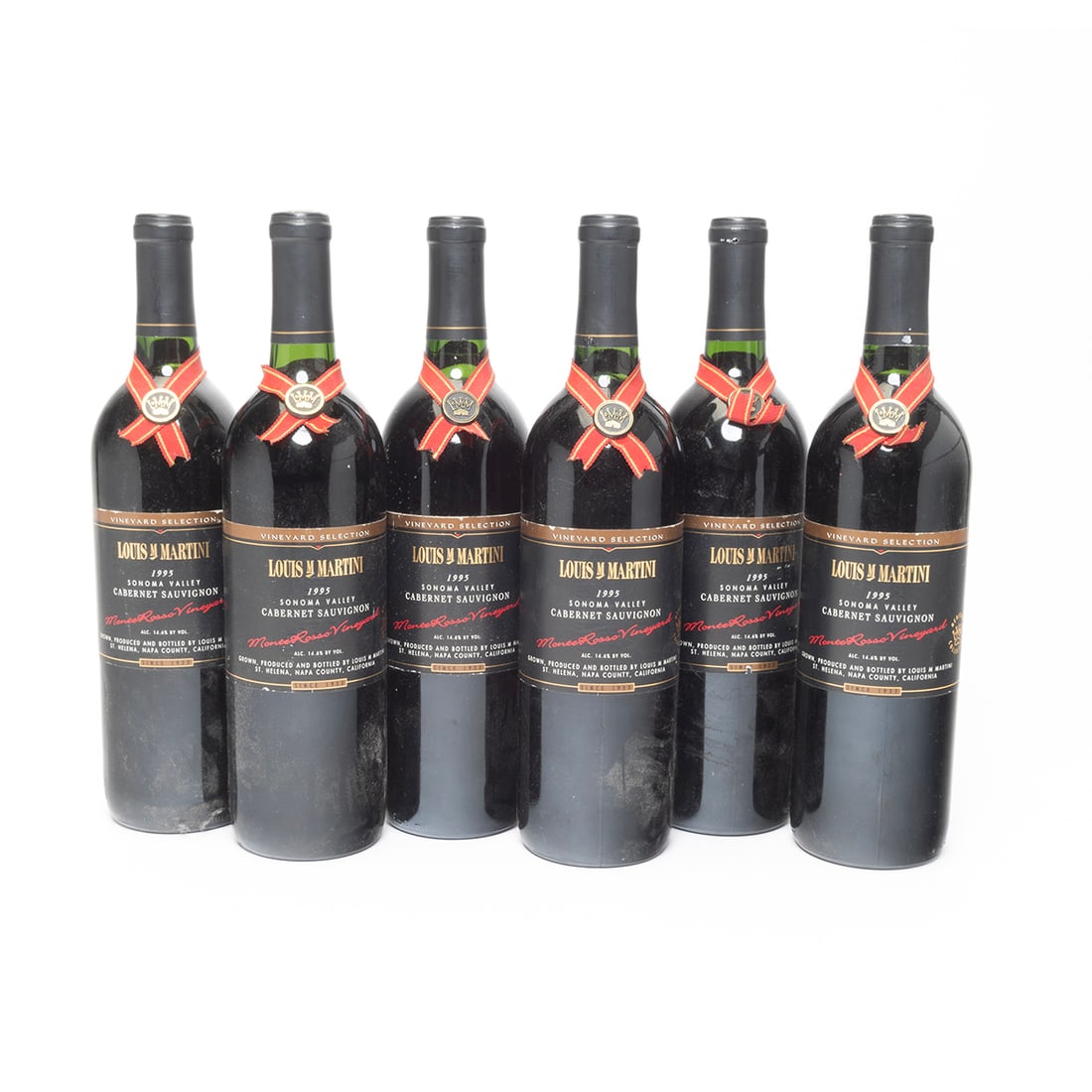Six Bottles 1995 Louis M Martini Cabernet Wine: Six Bottles 1995 Louis M Martini Cabernet Wine. Monte Rosso Vineyard Sonoma Valley Cabernet Sauvignon. Sonoma Valley, California. 750 ml. Condition: Labels, ribbons, and capsule wraps mostly in very g
